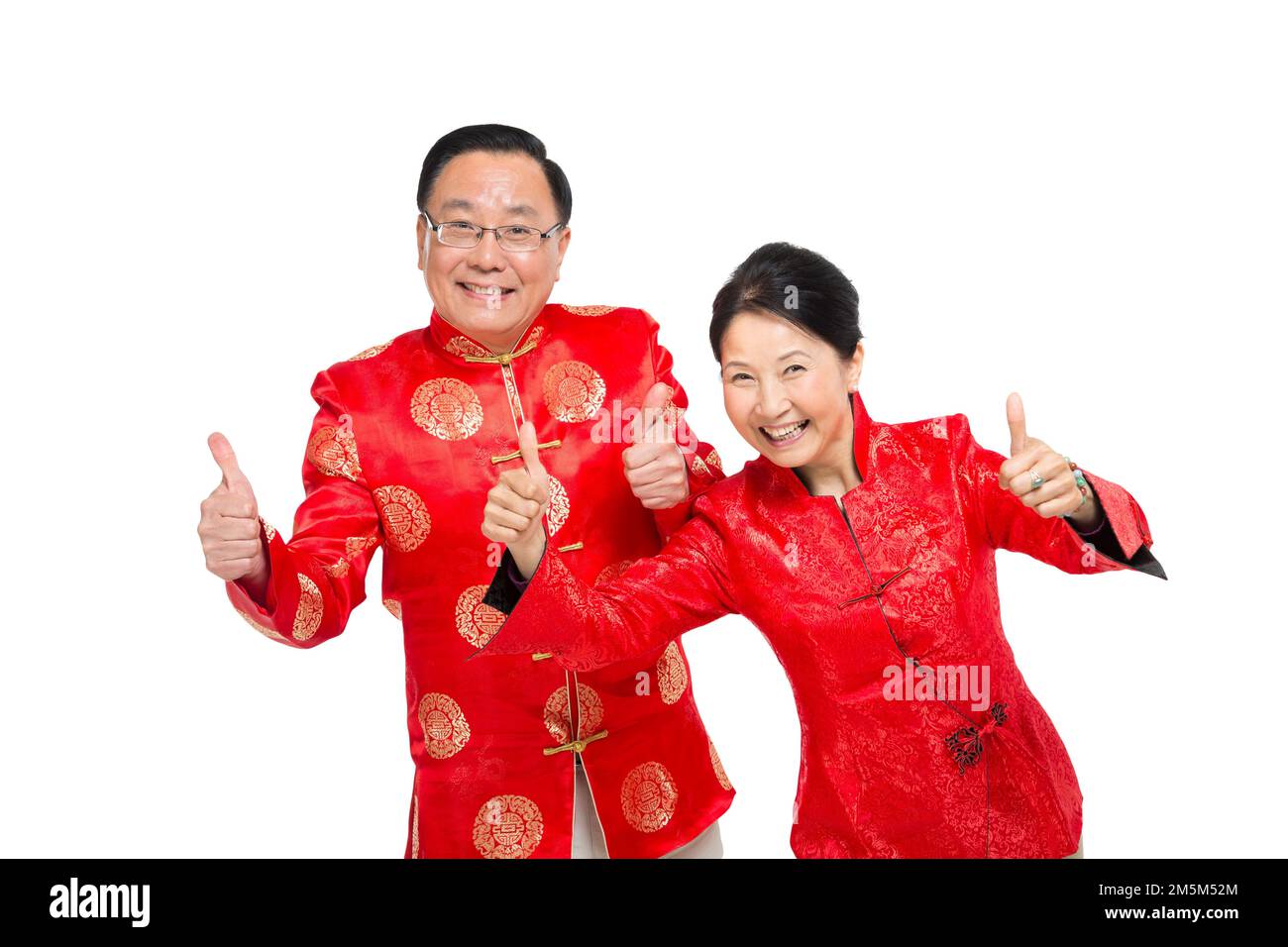 Frohes chinesisches Neujahrskostüm für ältere Paare Stockfoto