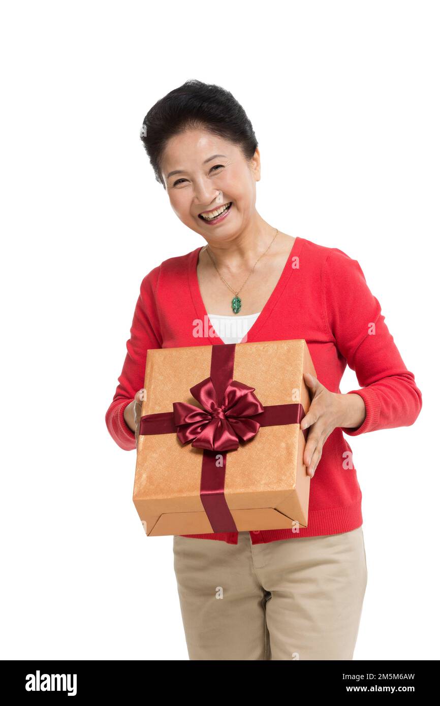 Zelt bis zu Frauen mittleren Alters und alten Frauen, die die Geschenkbox halten Stockfoto