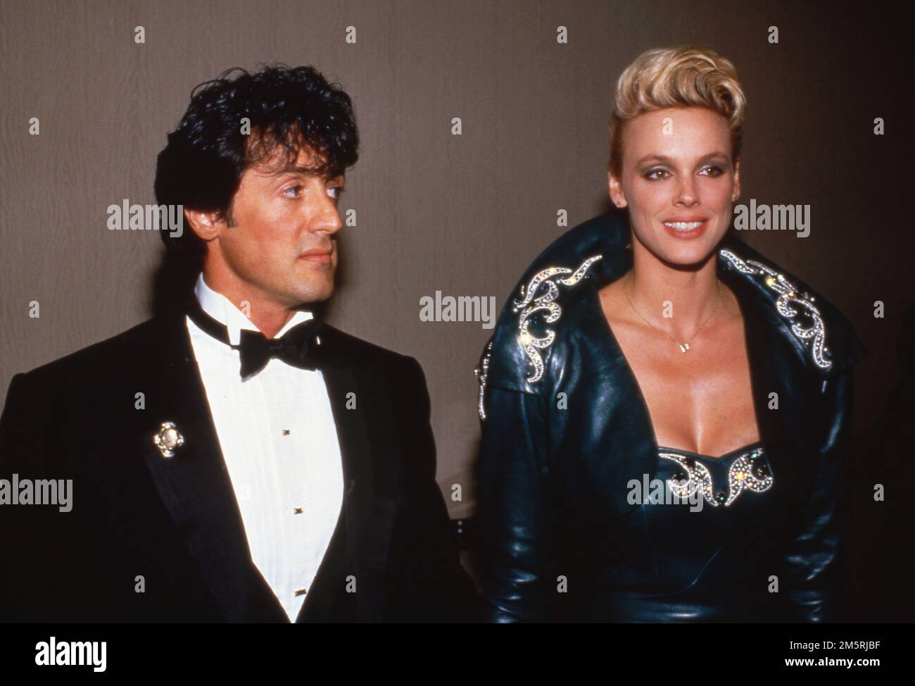 Sylvester Stallone und Brigitte Nielsen bei den National Association of Theater Owners (NATO) Awards 1986 im Century Plaza Hotel in Los Angeles, Kalifornien, 23. Oktober 1986 Kredit: Ralph Dominguez/MediaPunch Stockfoto