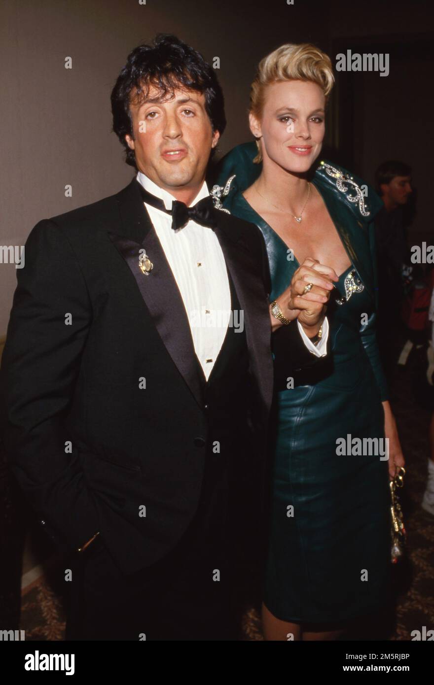 Sylvester Stallone und Brigitte Nielsen bei den National Association of Theater Owners (NATO) Awards 1986 im Century Plaza Hotel in Los Angeles, Kalifornien, 23. Oktober 1986 Kredit: Ralph Dominguez/MediaPunch Stockfoto