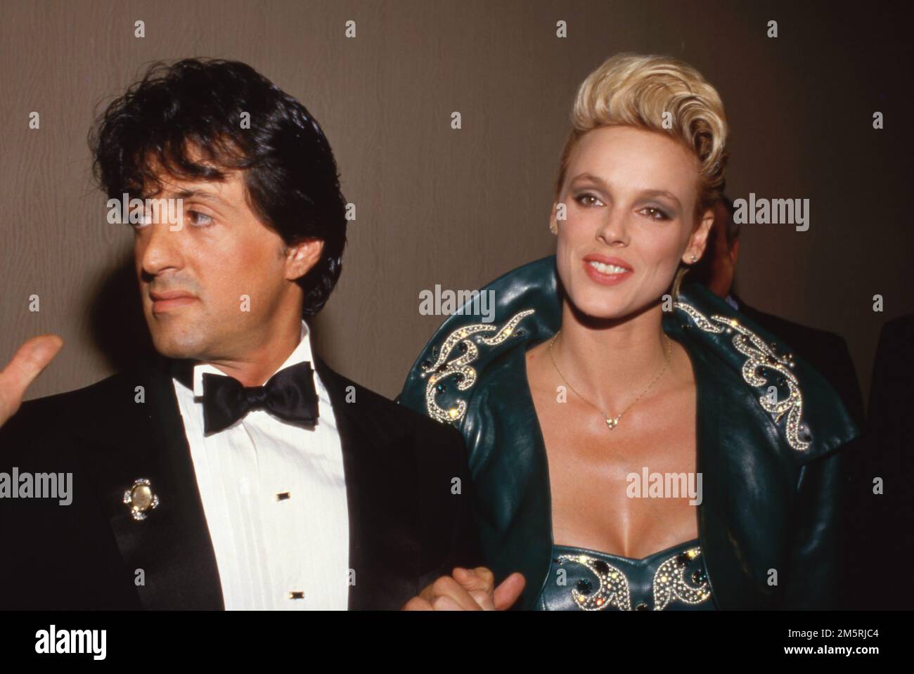 Sylvester Stallone und Brigitte Nielsen bei den National Association of Theater Owners (NATO) Awards 1986 im Century Plaza Hotel in Los Angeles, Kalifornien, 23. Oktober 1986 Kredit: Ralph Dominguez/MediaPunch Stockfoto