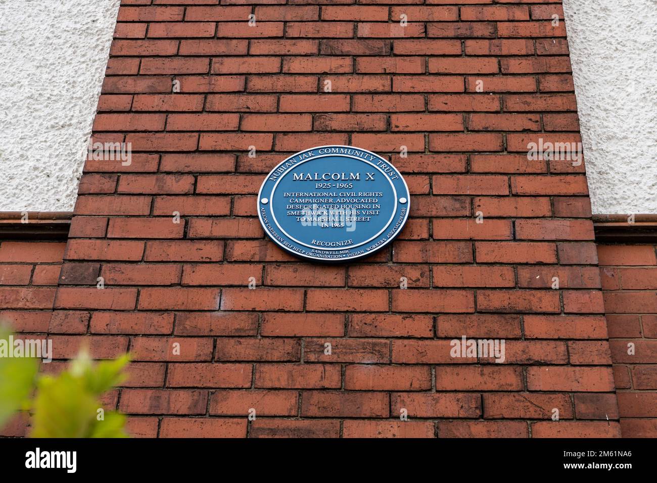 Malcolm X blaue Plakette auf der Marshall Street Sandwell Stockfoto