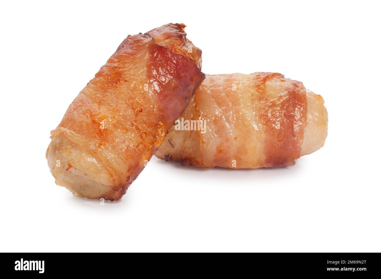 Studioaufnahme von traditionellen gekochten Schweinen in Decken, die vor weißem Hintergrund ausgeschnitten wurden - John Gollop Stockfoto
