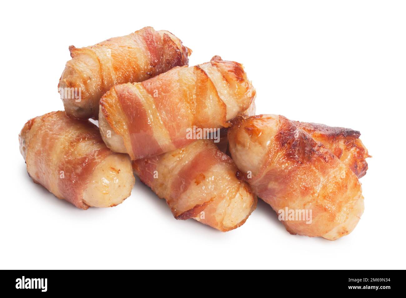 Studioaufnahme von traditionellen gekochten Schweinen in Decken, die vor weißem Hintergrund ausgeschnitten wurden - John Gollop Stockfoto