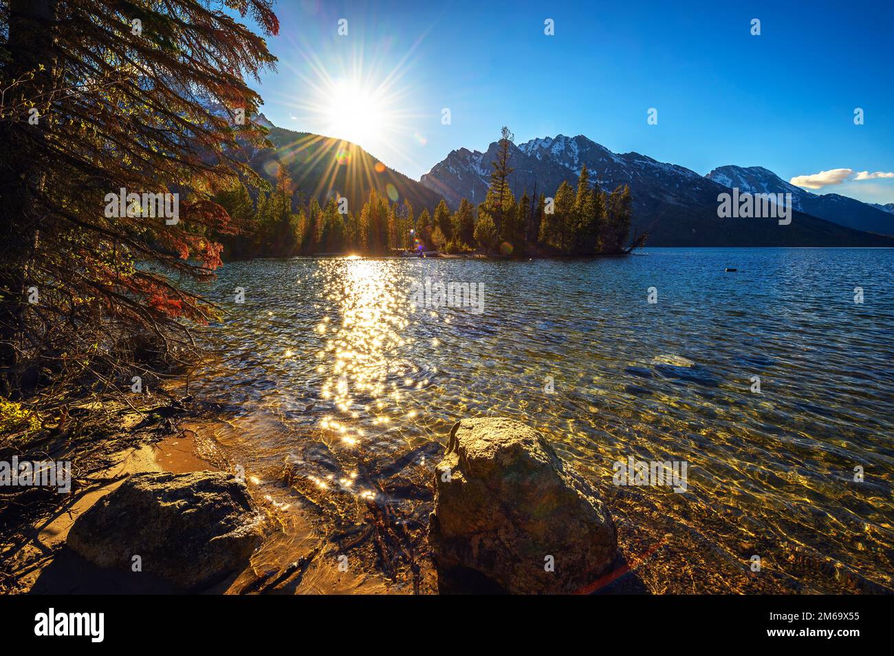 Sonnenuntergang über dem Jenny Lake und den Grand Teton Mountains in Wyoming, USA Stockfoto