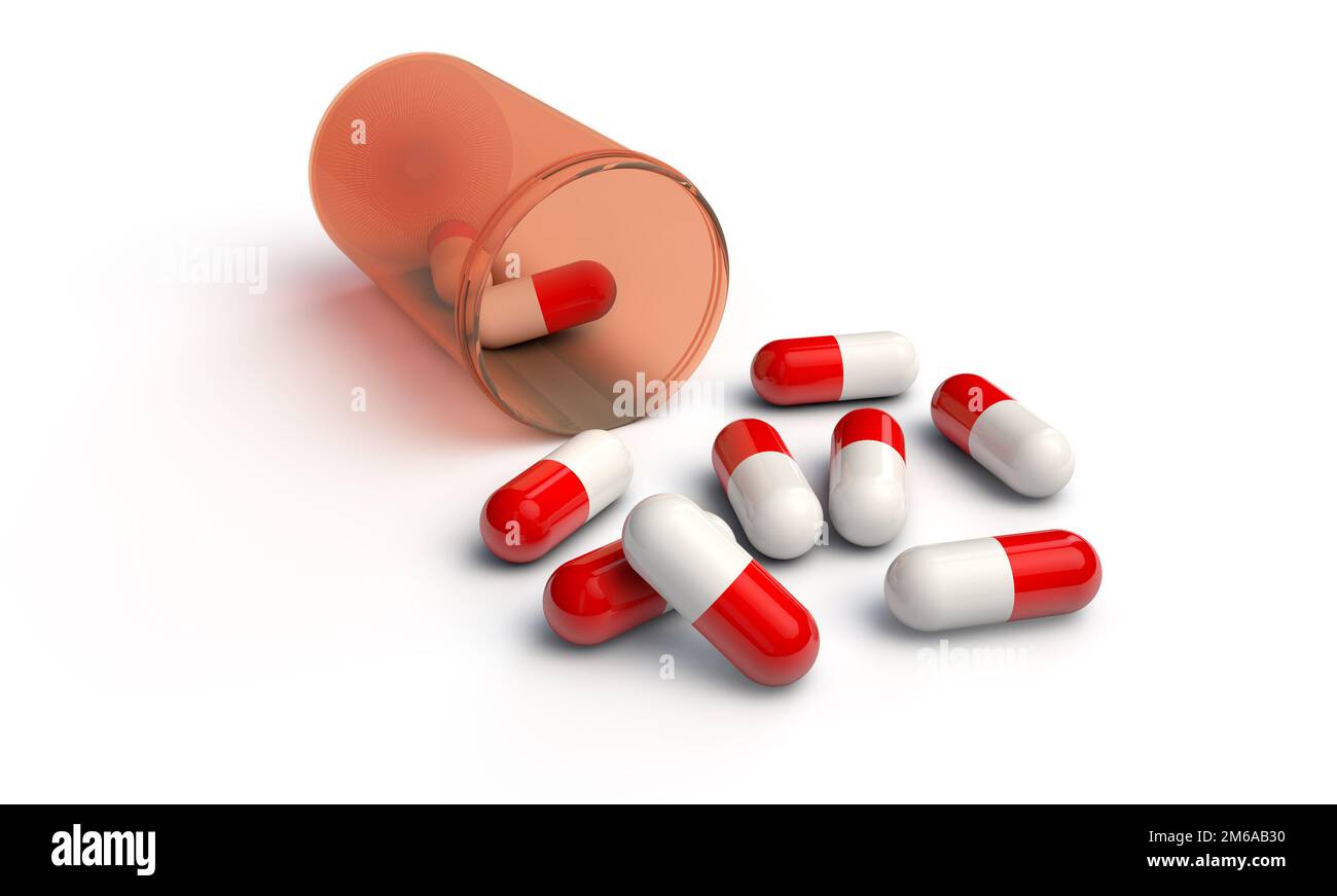 Verschüttete Kapseln aus einem Behälter Stockfoto