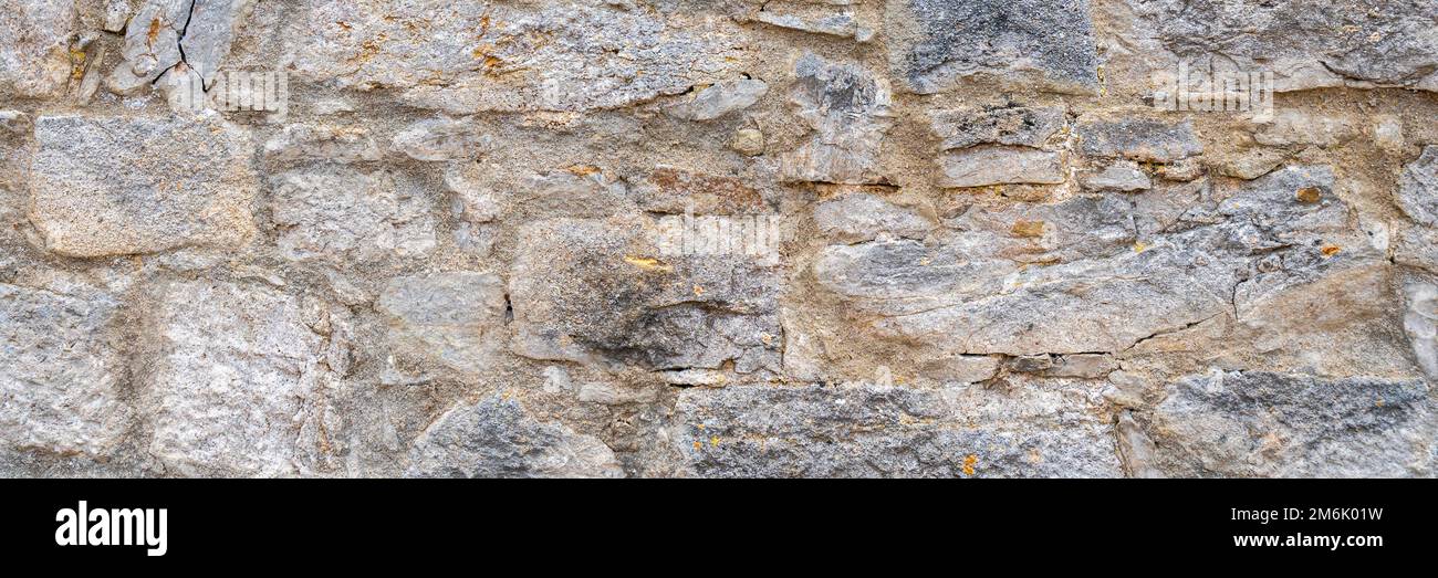 Historische Mauer mit alten Steinen Stockfoto