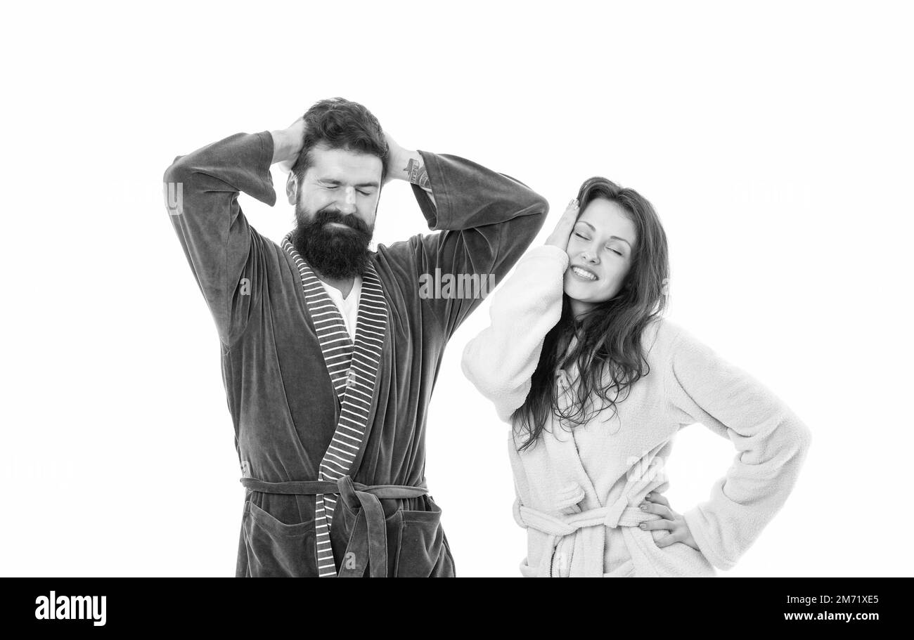 Sie fühlen sich wie ein Gefühls. Familienpaar mit einem scheuen Look. Müde Mann und Frau in Roben. Müdigkeit Stockfoto