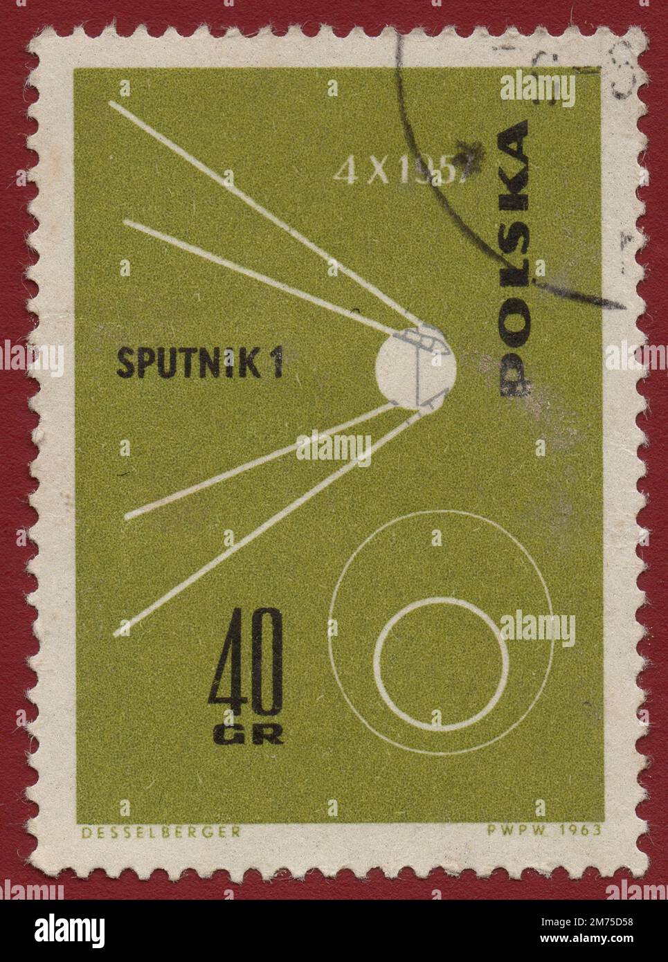 POLEN - CA. 1963: Ein von Polen gedruckter Stempel zeigt, dass Sputnik 1 der erste künstliche Erdsatellit war, der von der UdSSR etwa 1963 gestartet wurde. Stockfoto