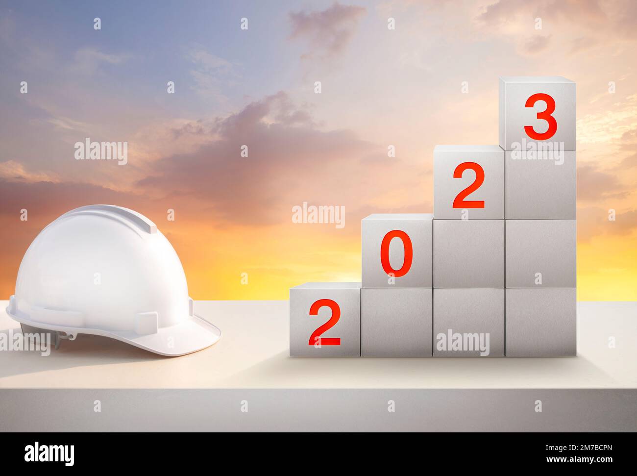 Konstruieren Sie einen Arbeitstisch und einen goldenen Himmel für die Vorbereitung der Willkommensfeier zum Neujahr 2023 .Change und für das Aufwachsen für das neue Baugeschäft. Stockfoto
