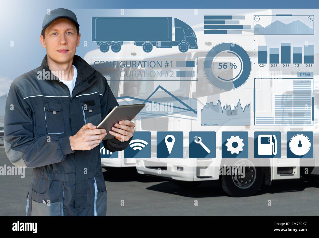 Manager mit einem digitalen Tablet neben Trucks. Flottenmanagement Stockfoto