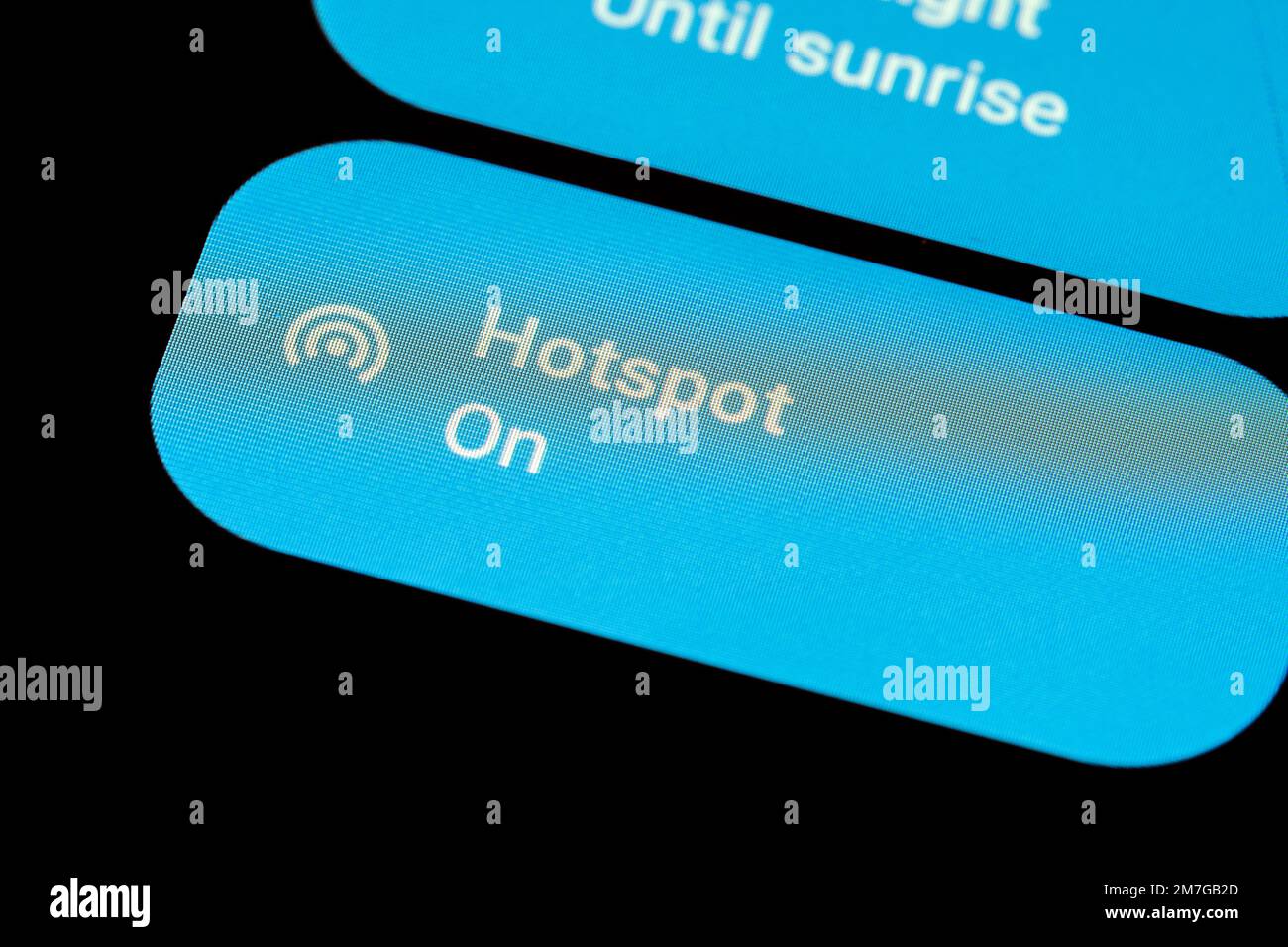 Aktivierte Steuerungstaste eines Smartphone-Hotspots Stockfoto Aktivierte Steuerungstaste eines Smartphone-Hotspots Stockfoto