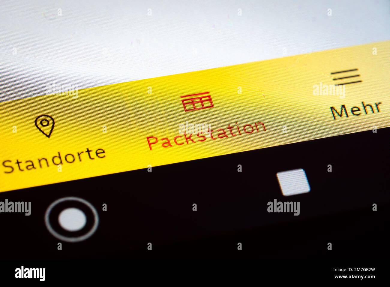 Logo der DHL Packstation auf einem Android-Gerät Stockfoto