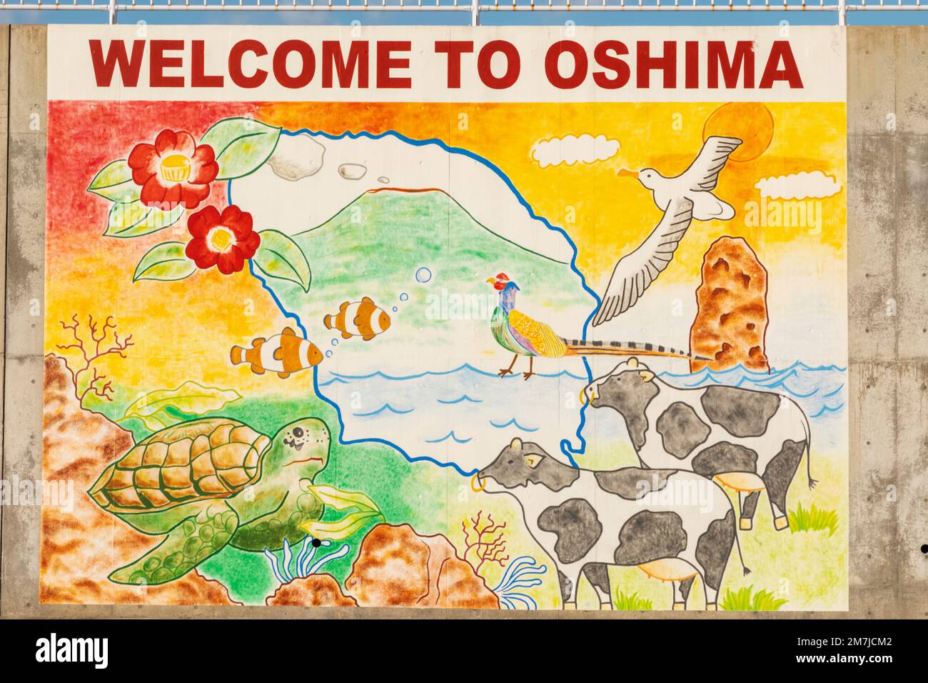 Japan, Honshu, Izu-Oshima Island, Begrüßungsschild mit lokalen Sehenswürdigkeiten Stockfoto