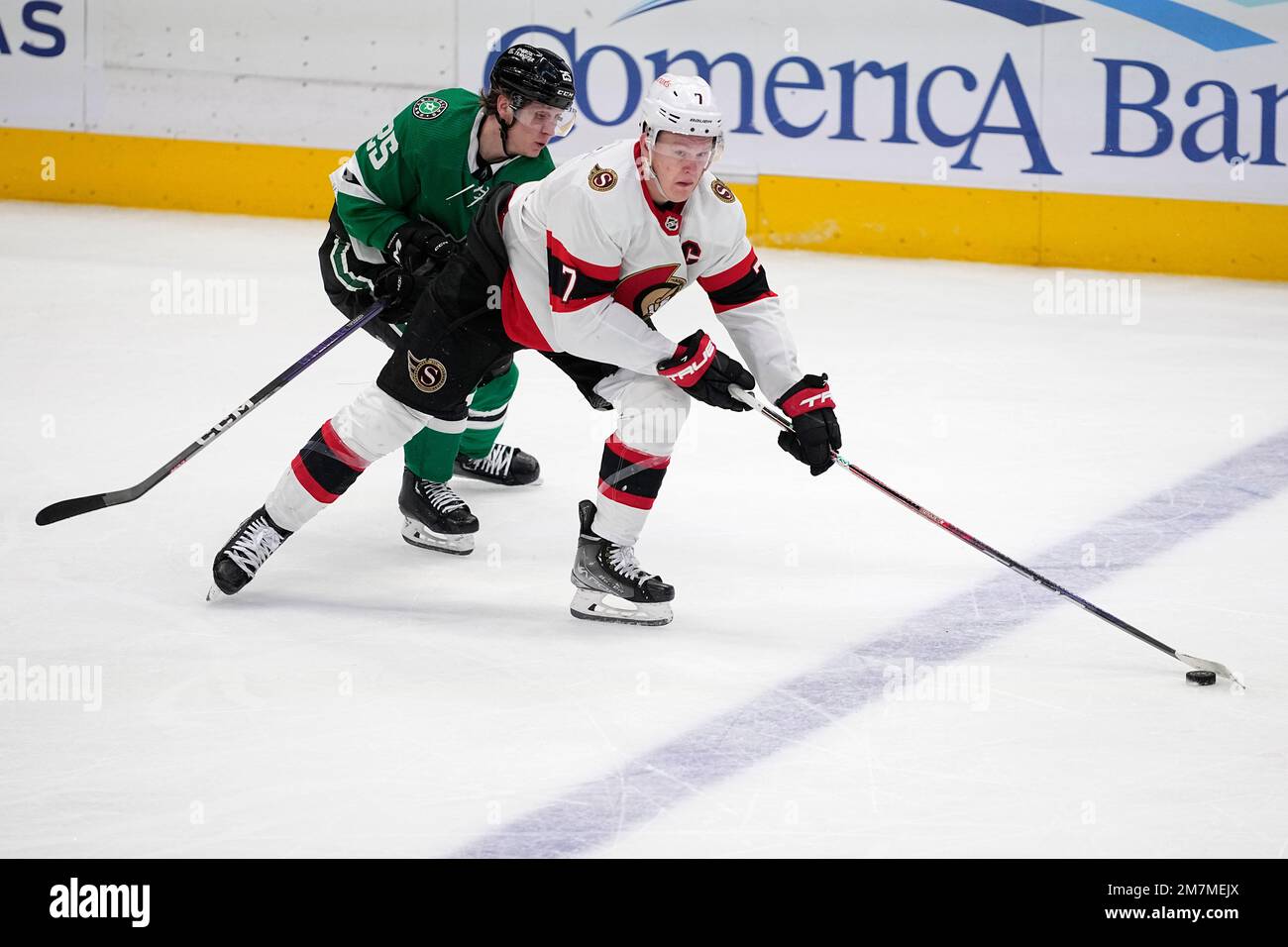 Ottawa Senators left wing Brady Tkachuk (7) controls the puck in front ...