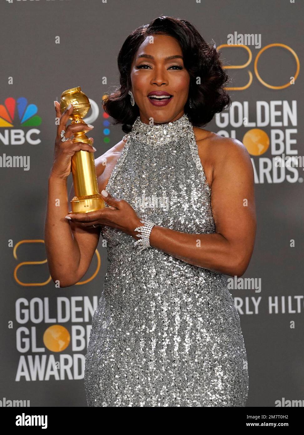 Angela Bassett poses in the press room with the award for best ...