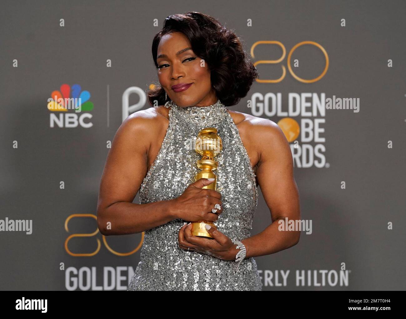 Angela Bassett poses in the press room with the award for best ...