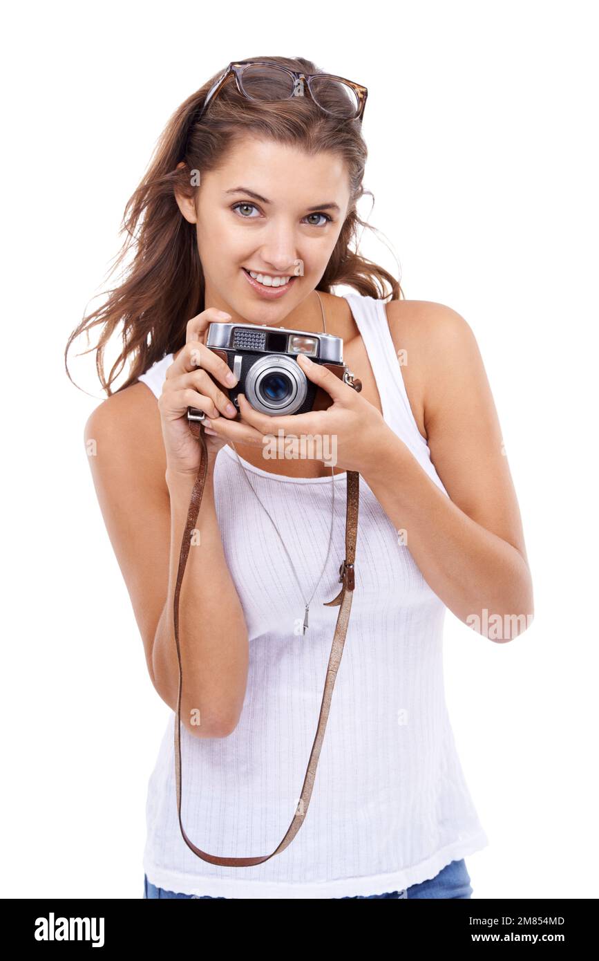 Leben durch Fotografie. Studioportrait einer jungen Frau mit einer Vintage-Kamera. Stockfoto Leben durch Fotografie. Studioportrait einer jungen Frau mit einer Vintage-Kamera. Stockfoto
