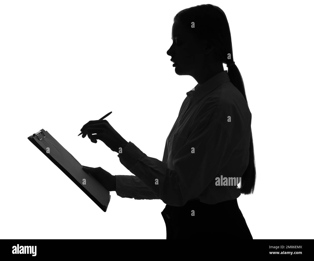Silhouette einer jungen Geschäftsfrau mit Klemmbrett auf weißem Hintergrund Stockfoto