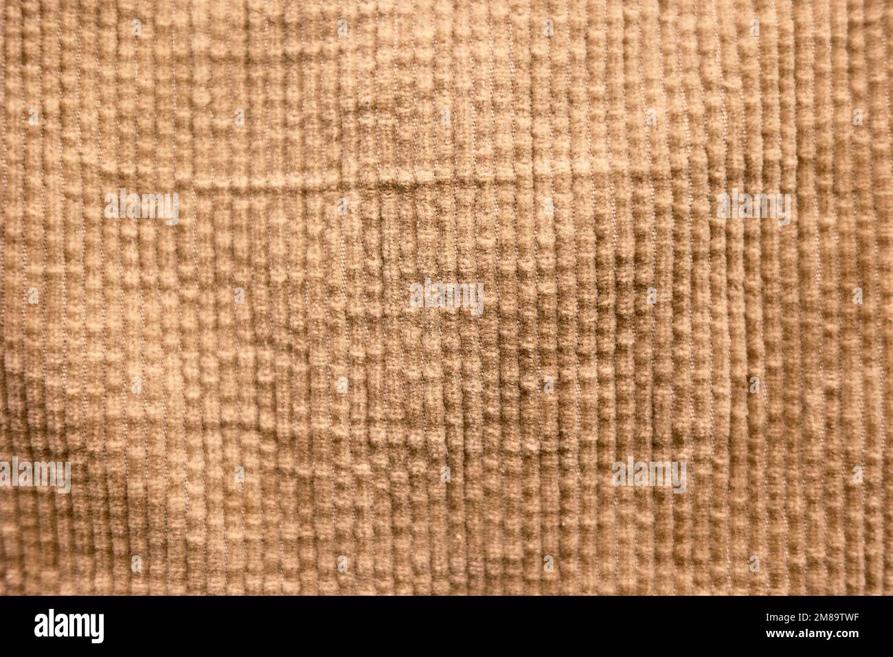 Die Textur von Cord in beige-brauner Farbe Stockfoto
