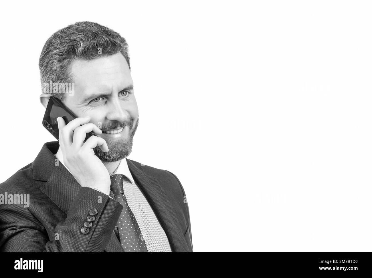 Glücklicher Manager sprechen auf dem Handy mit Mobilfunktechnologie für die Kommunikation, mobil Stockfoto