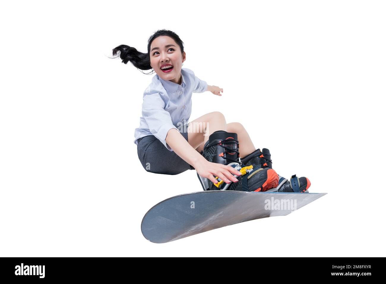 Eine junge Geschäftsfrau zum Skifahren Stockfoto