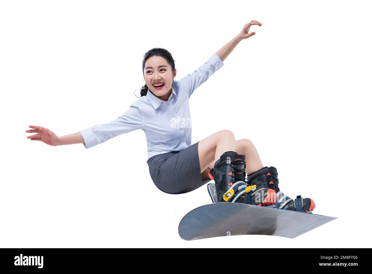 Eine junge Geschäftsfrau zum Skifahren Stockfoto