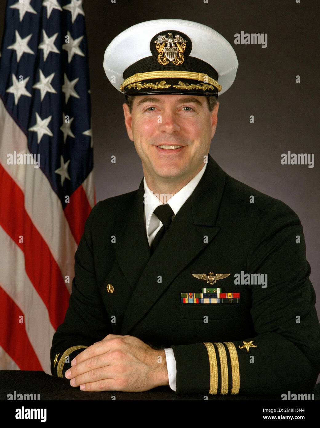 CDR Walter L. Baker, USNR (gedeckt). Land: Unbekannt Stockfoto