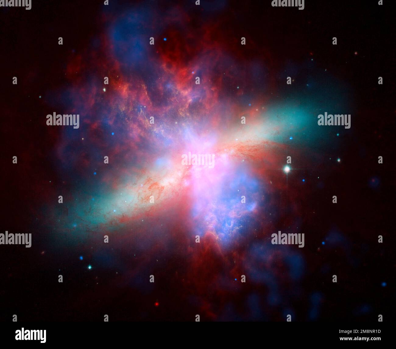 Spitzer Röntgensichtbares Infrarotbild von M82 Stockfoto