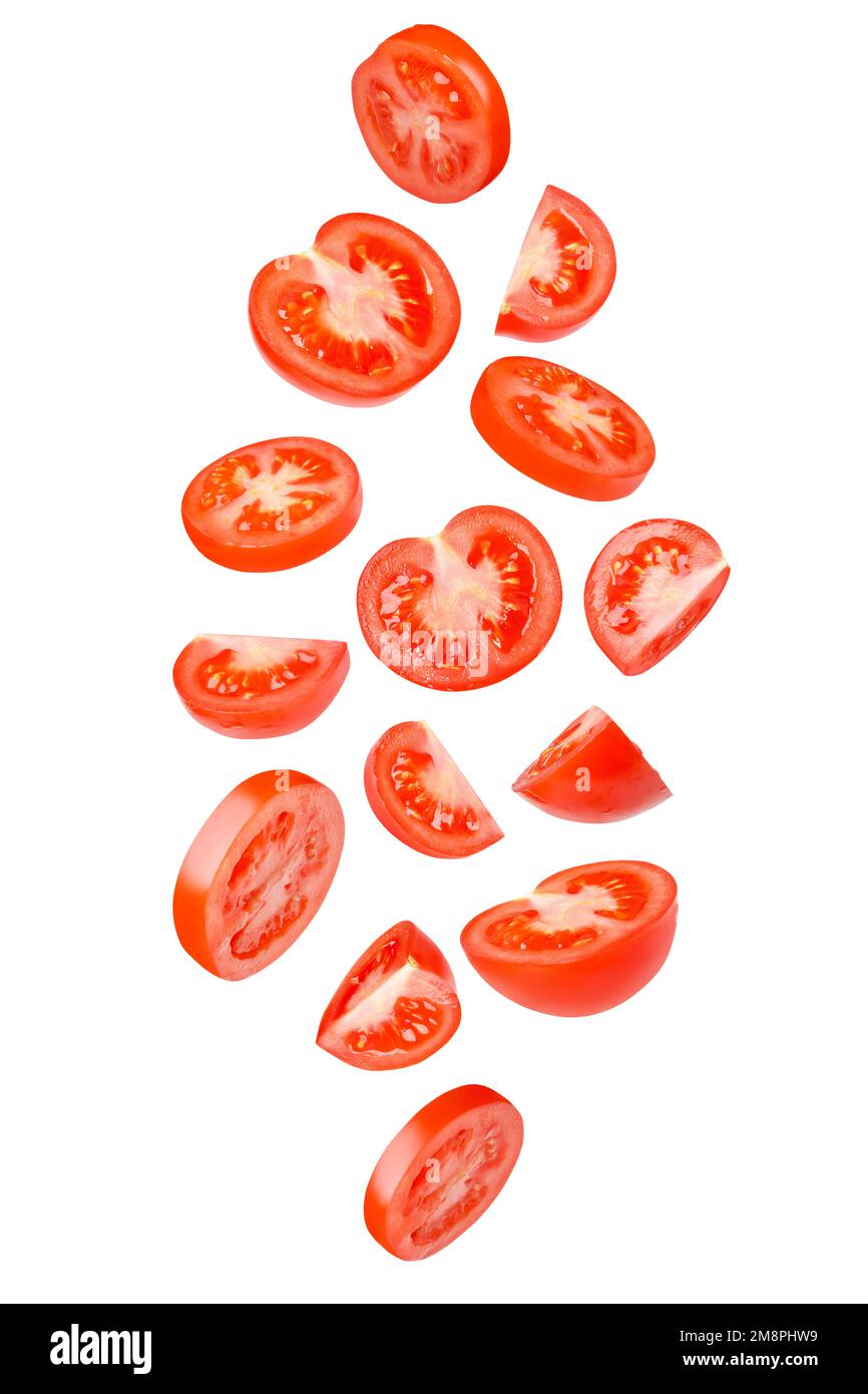 Fliegende Tomaten in verschiedene Formen geschnitten. Tomaten, Tomaten, geschnitten, frische Tomaten. Isoliert. Stockfoto