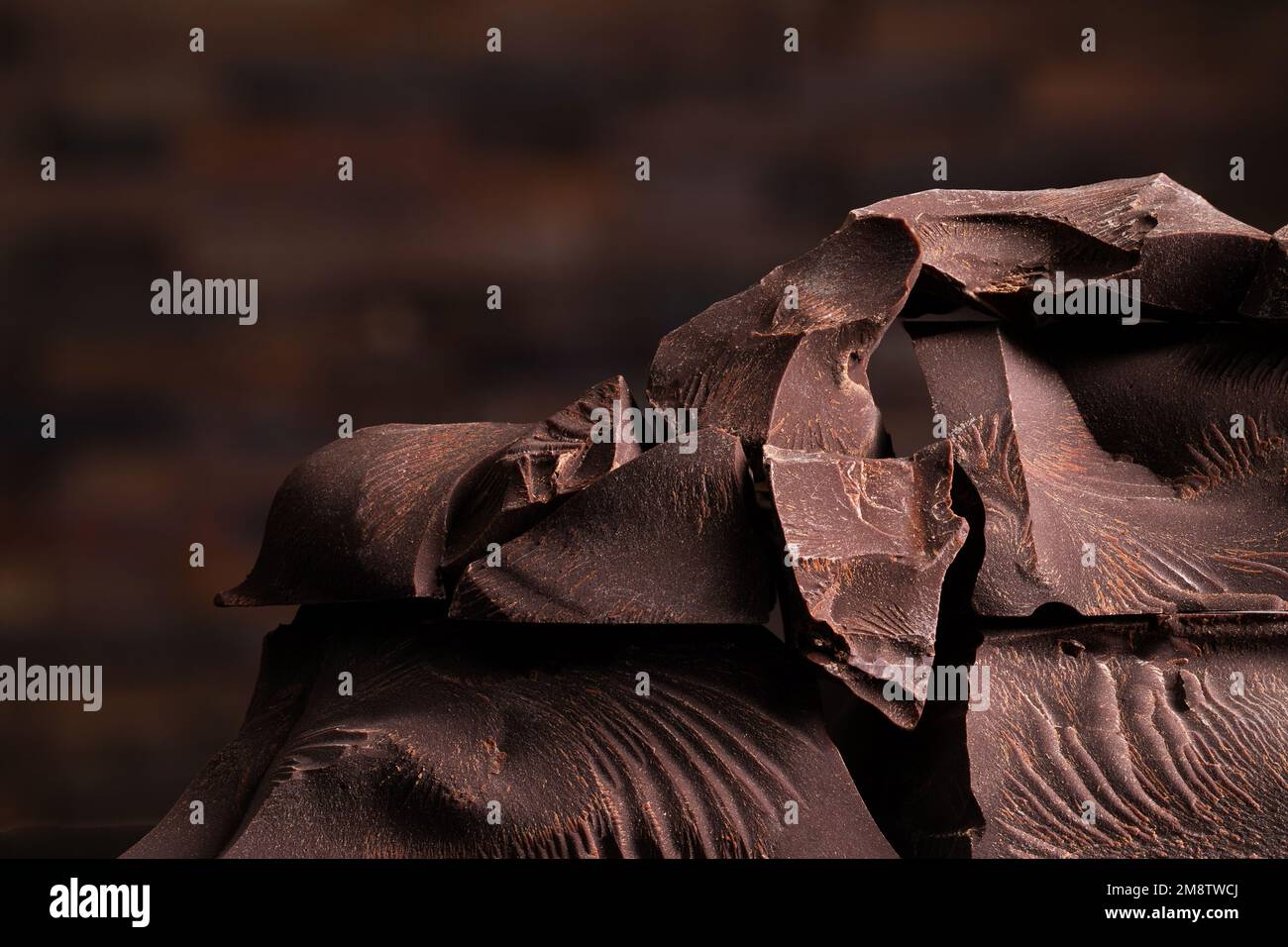 Mehr Schokoladenstücke, ein Haufen süßer Süßigkeiten Stockfoto