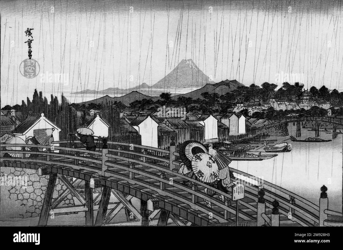 Dusche auf der Nihonbashi Bridge, aus der Reihe berühmter Orte in der östlichen Hauptstadt Utagawa Hiroshige (Ando) (Japanisch, 1797-1858). Dusche auf der Nihonbashi Bridge, aus der Reihe berühmter Orte in der östlichen Hauptstadt, ca. 1832. Farbiger Holzblockdruck auf Papier, 10 5/16 x 15 1/4in. (26,2 x 38,7cm). Aufgrund ihrer Menge und Verfügbarkeit spielten japanische Farbmuster aus Holzblöcken eine besonders wichtige Rolle bei der Förderung Japonisms. Dieses Werk veranschaulicht einige der formalen Merkmale, die westliche Künstler so erfrischend anders fanden: Kompositionen mit starken Diagonalen oder asymmetrischen Anordnungen, Stockfoto
