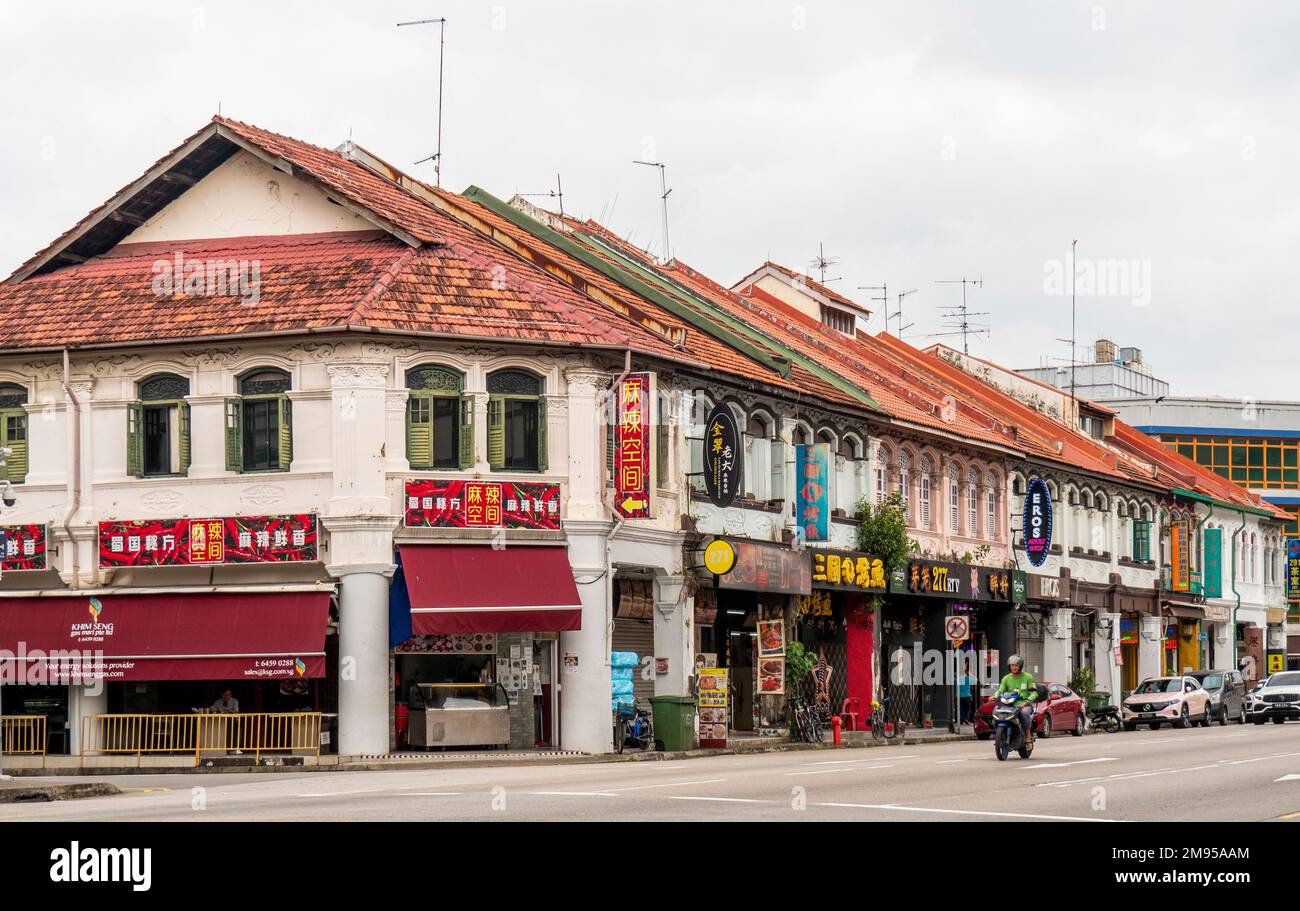 Motorradfahrer auf der North Bridge Rd Kampong Glam Singapur Stockfoto