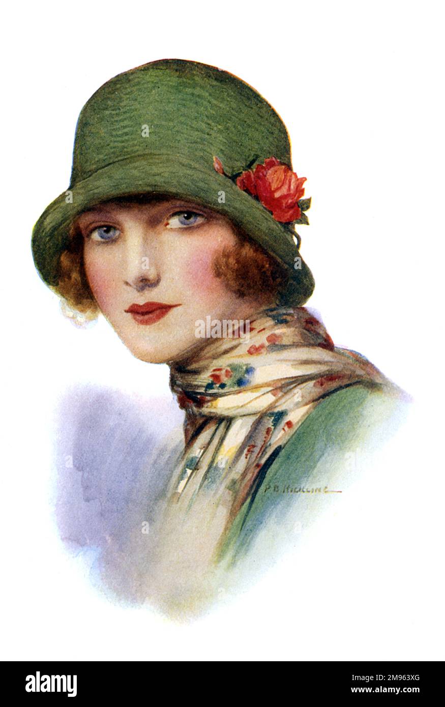 Eine rosige, junge blonde Frau in einem fabelhaften grünen Glockenhut mit einer umgedrehten Krempe und einer roten Rose. Sie trägt auch einen langen Schal mit Blumenmuster. Stockfoto