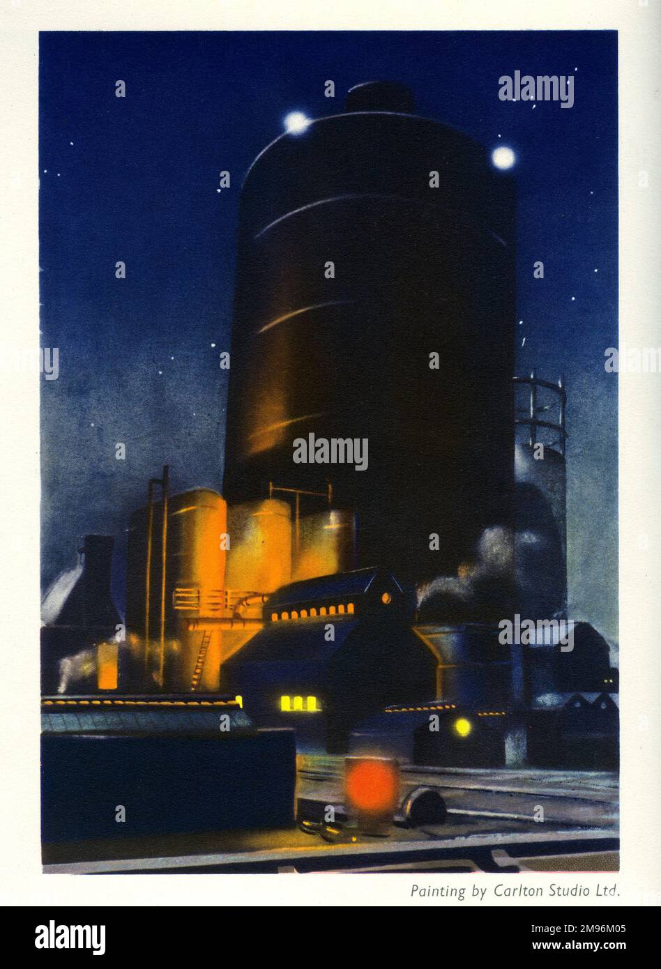 Print User's Yearbook -- eine Fabrikszene bei Nacht. Stockfoto