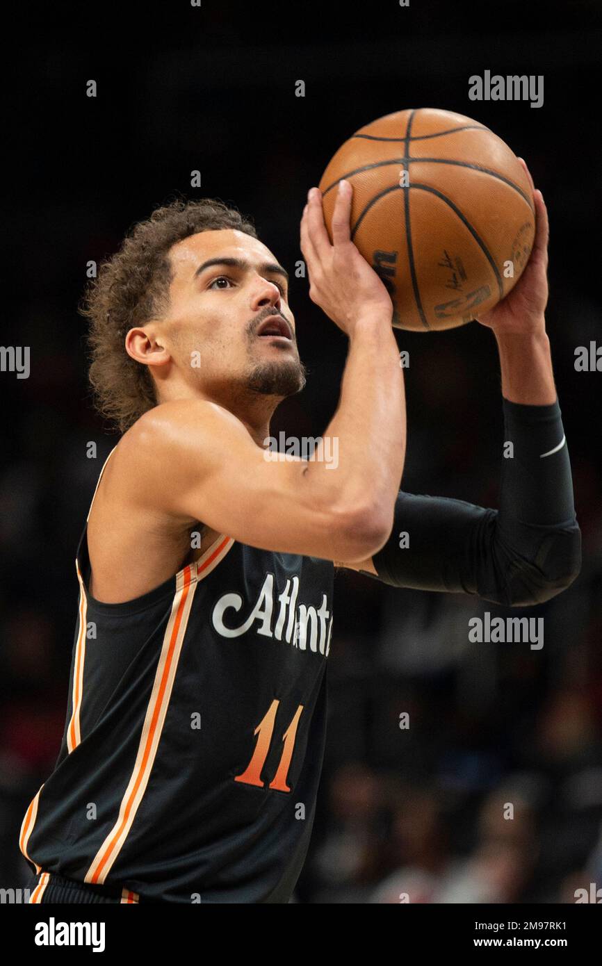 Atlanta Hawks guard Trae Young shoots a free throw during the first half of  an NBA basketball game against the Miami Heat, Monday, Jan. 16, 2023, in  Atlanta. (AP Photo/Hakim Wright Sr