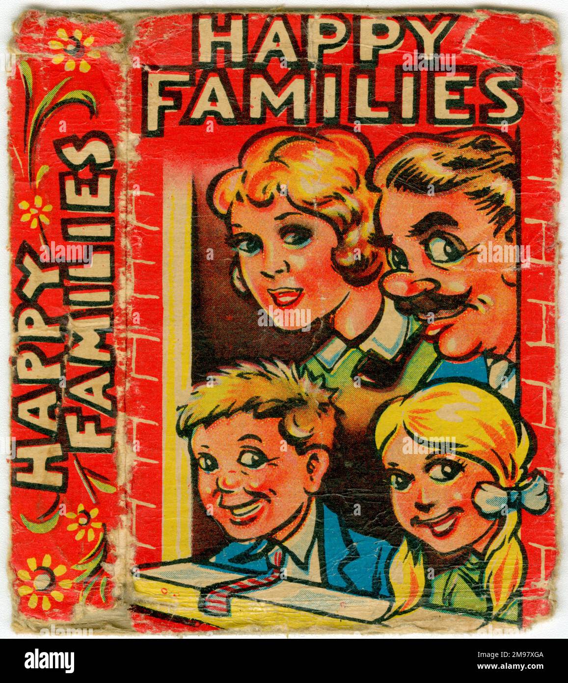 Glückliche Familien, die Karten spielen - Packpackung. Stockfoto