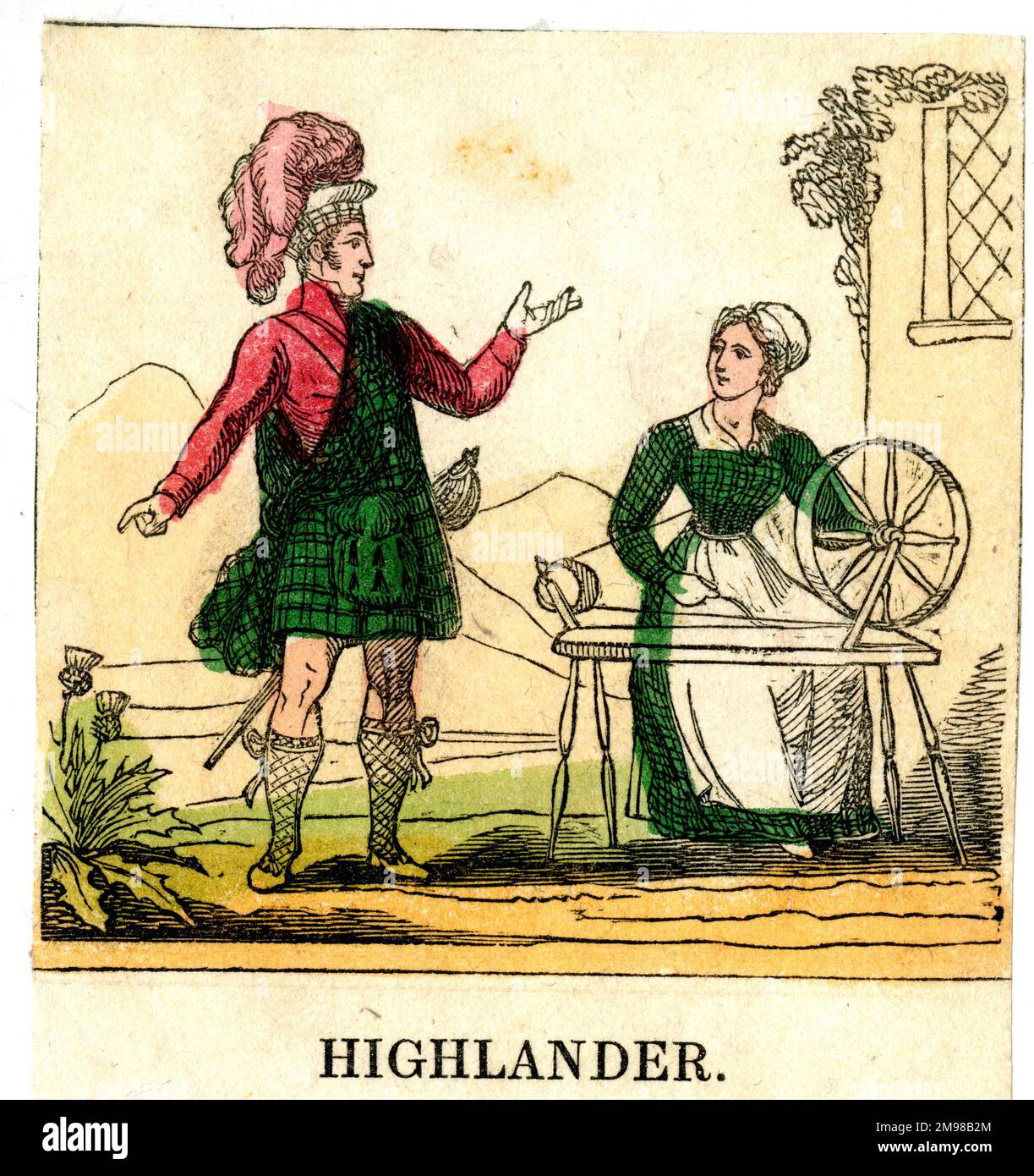 Schottischer Highlander und Frau, die sich dreht. Stockfoto