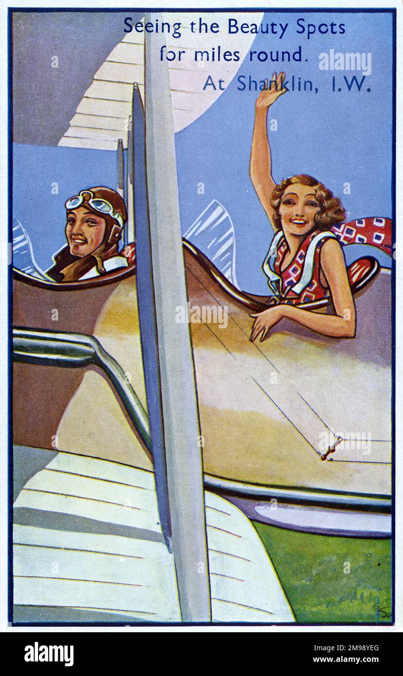 Eine Fahrt über die Isle of Wight in einem zweisitzigen Flugzeug. Die weibliche Passagierin hat keinen fliegenden Hut/Helm und keine Schutzbrille und genießt daher offensichtlich das Gefühl des Windes in ihrem Haar! Ich sehe die Schönheitsflecken meilenweit. In Shanklin, I. W. Stockfoto