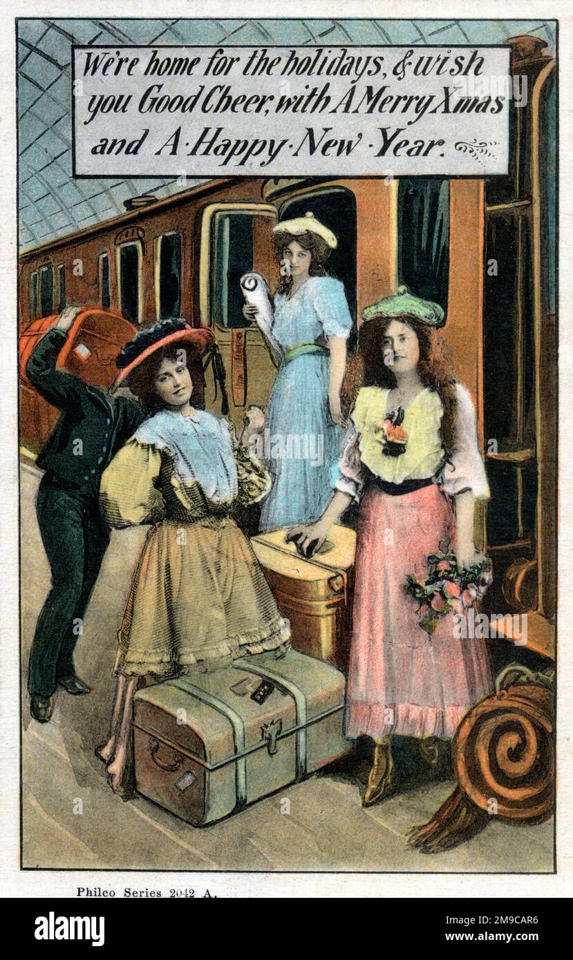 Weihnachtsgrüße und Neujahrsgrüße Postkarte - drei junge Damen kommen mit dem Zug nach Hause für die Feiertage. Stockfoto