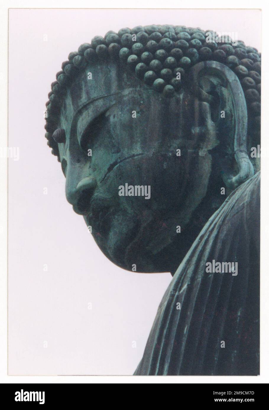 Der Kopf der Statue des großen Buddha, Kamakura. Bronzestatue im Jahre 1252 n. Chr. Es ist die zweitgrößte Buddha-Statue in Japan. Stockfoto