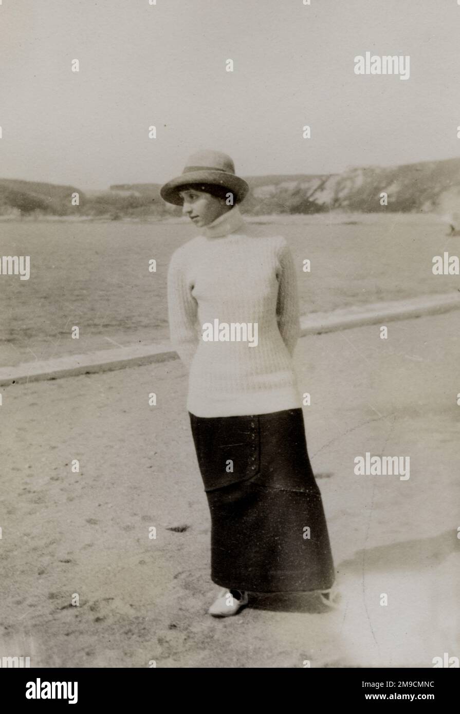 Eine Frau am Strand Stockfoto