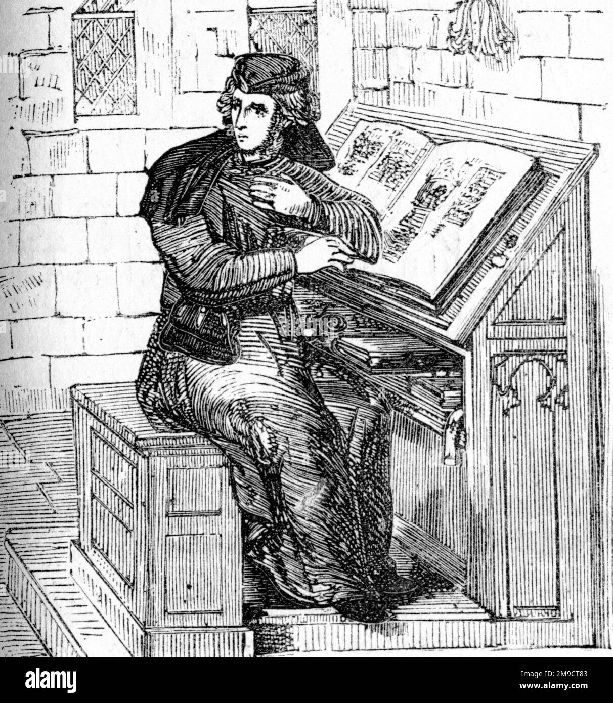 Ein Gelehrter, der ein Buch schreibt Stockfoto