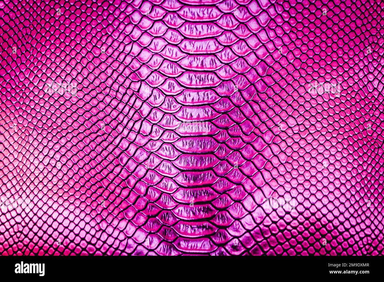Pink luxuriöse Schlangenhaut als Hintergrund Stockfoto