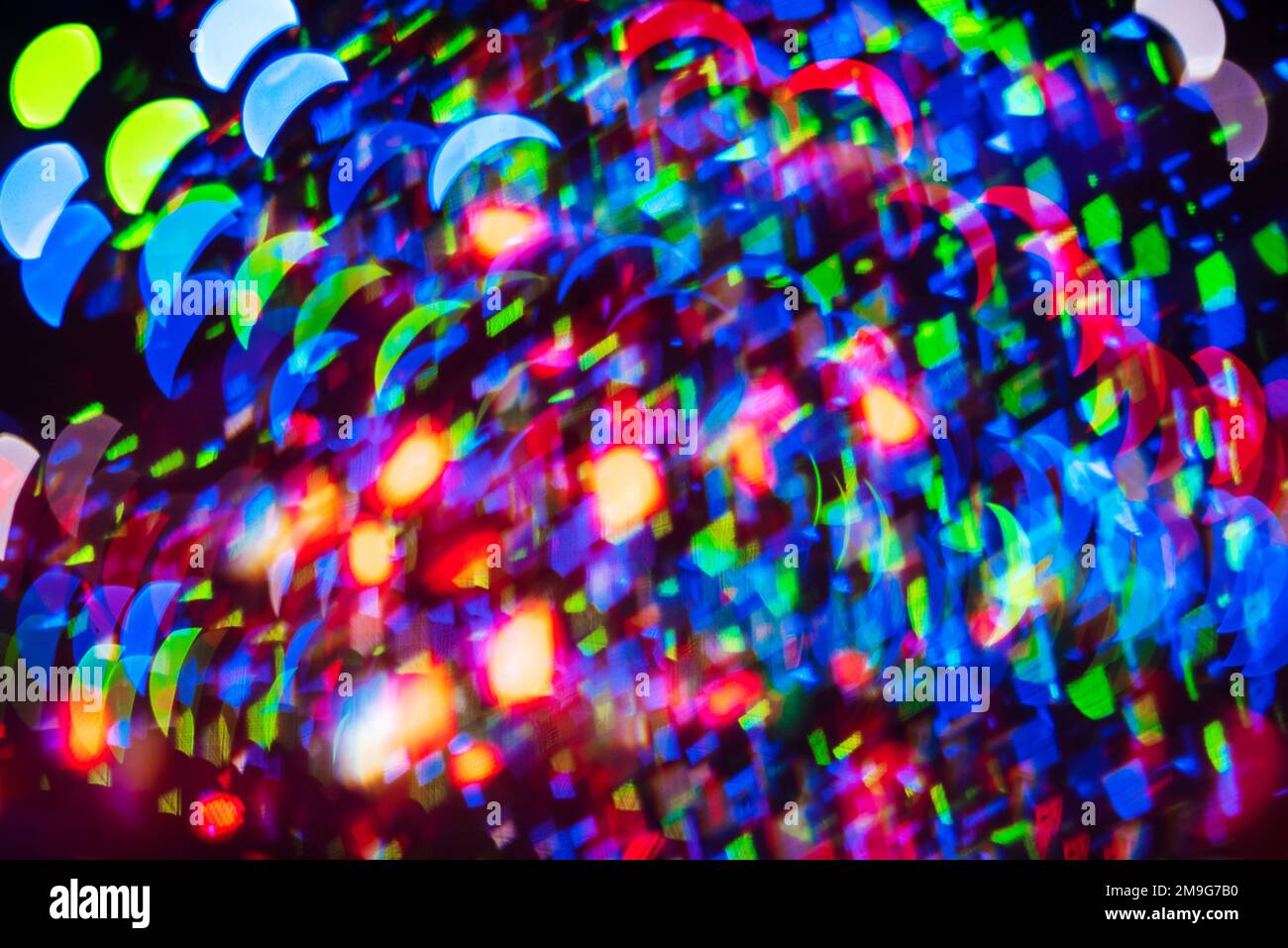 Verschwommener abstrakter heller Hintergrund mit mehrfarbigem Unschärfe-Bokeh Stockfoto