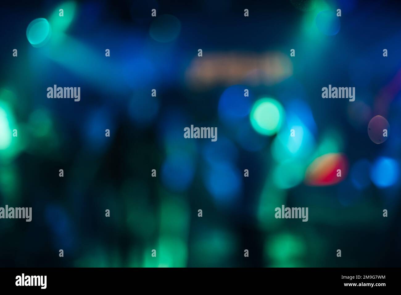 Mehrfarbiger, verschwommener Hintergrund mit rundem, hellem Bokeh Stockfoto