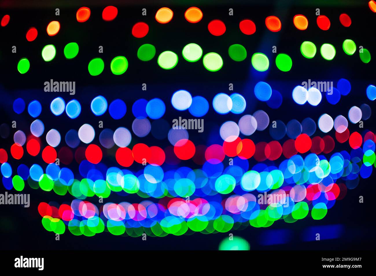 Verschwommener abstrakter Hintergrund mit bunten runden, hellen Bokeh Stockfoto