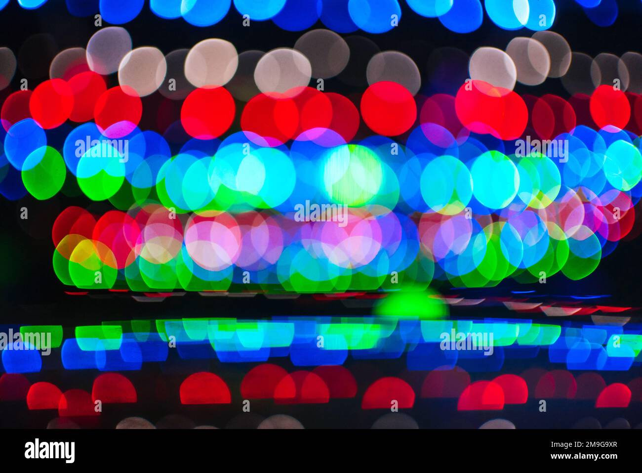 Verschwommener abstrakter Hintergrund mit bunten runden, hellen Bokeh Stockfoto