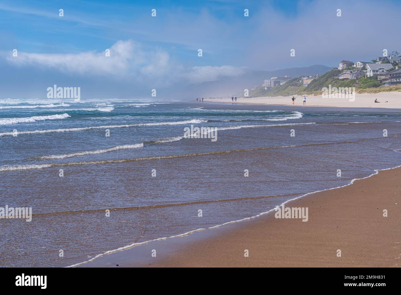 Meereswellen am Sandstrand, Oregon, USA Stockfoto