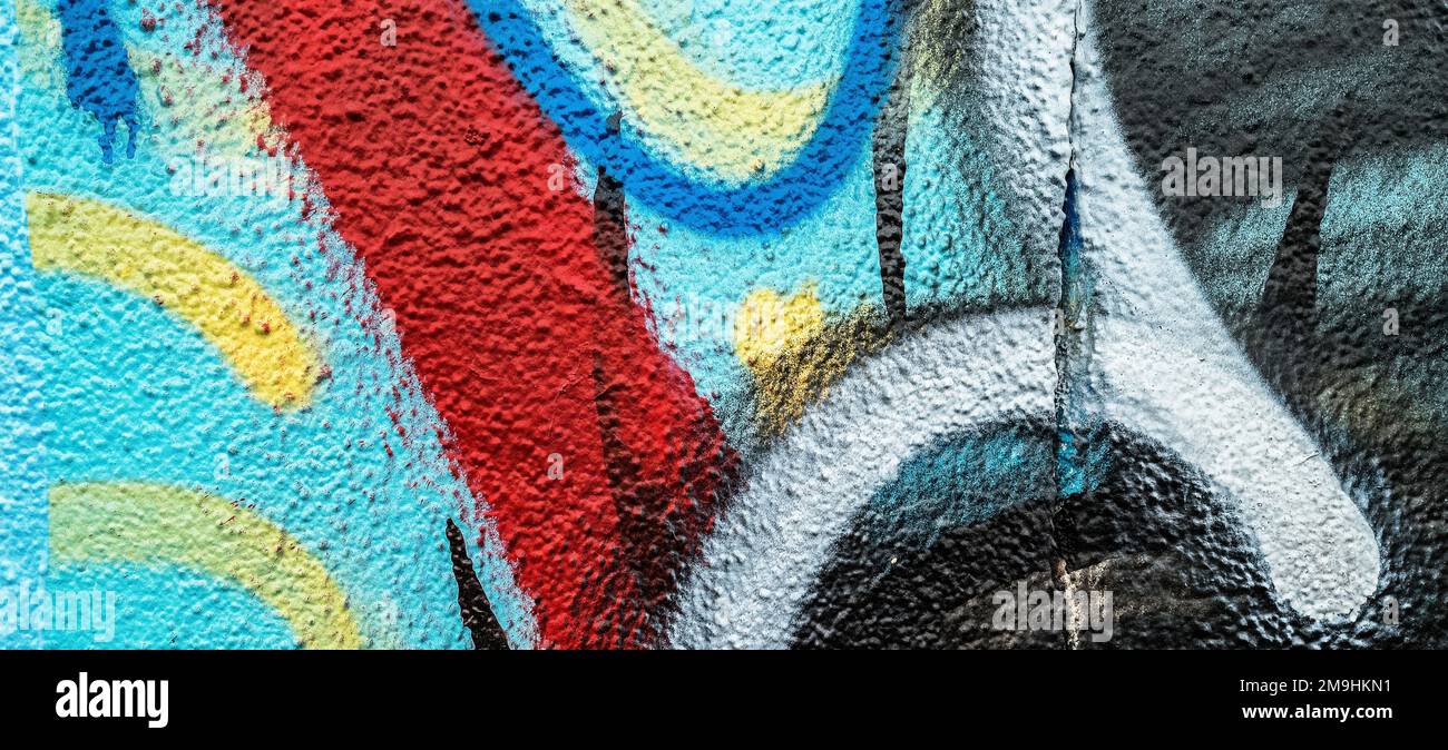 Nahaufnahme von farbenfrohem Graffiti an der Wand Stockfoto